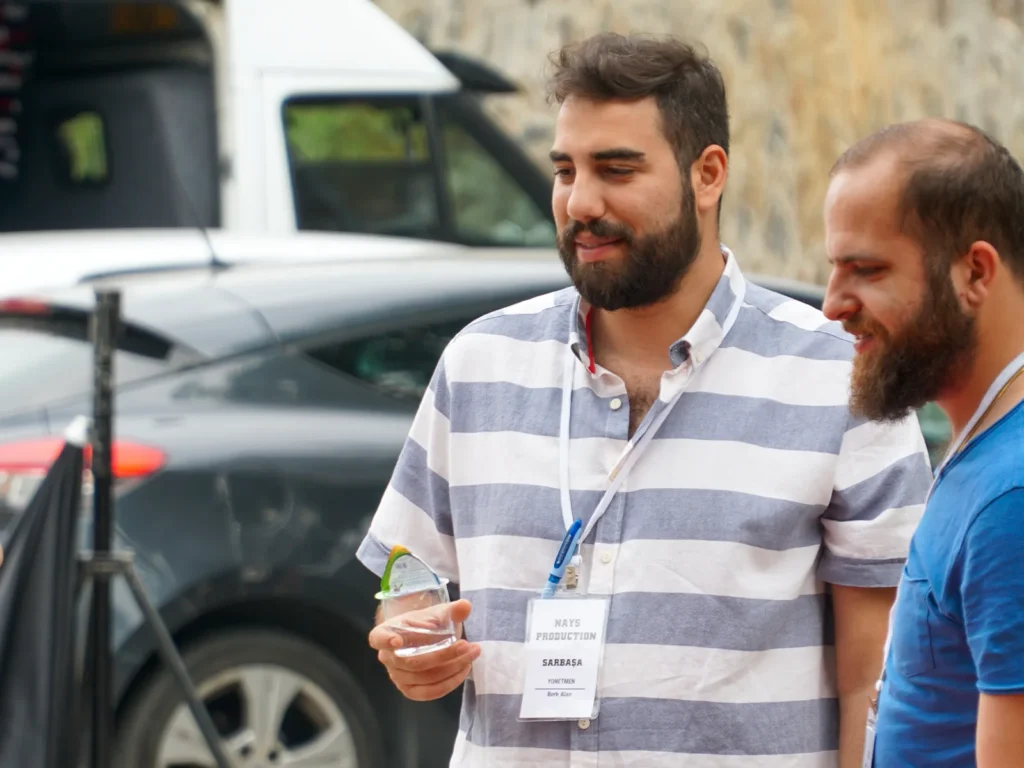 Director and crew members during the filming of Sar Başa